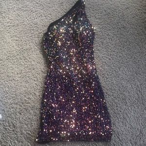 A beautiful sequined dress with a gorgeous back